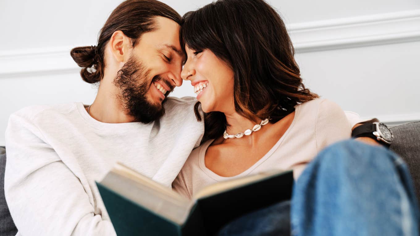 couple spending time together reading a book