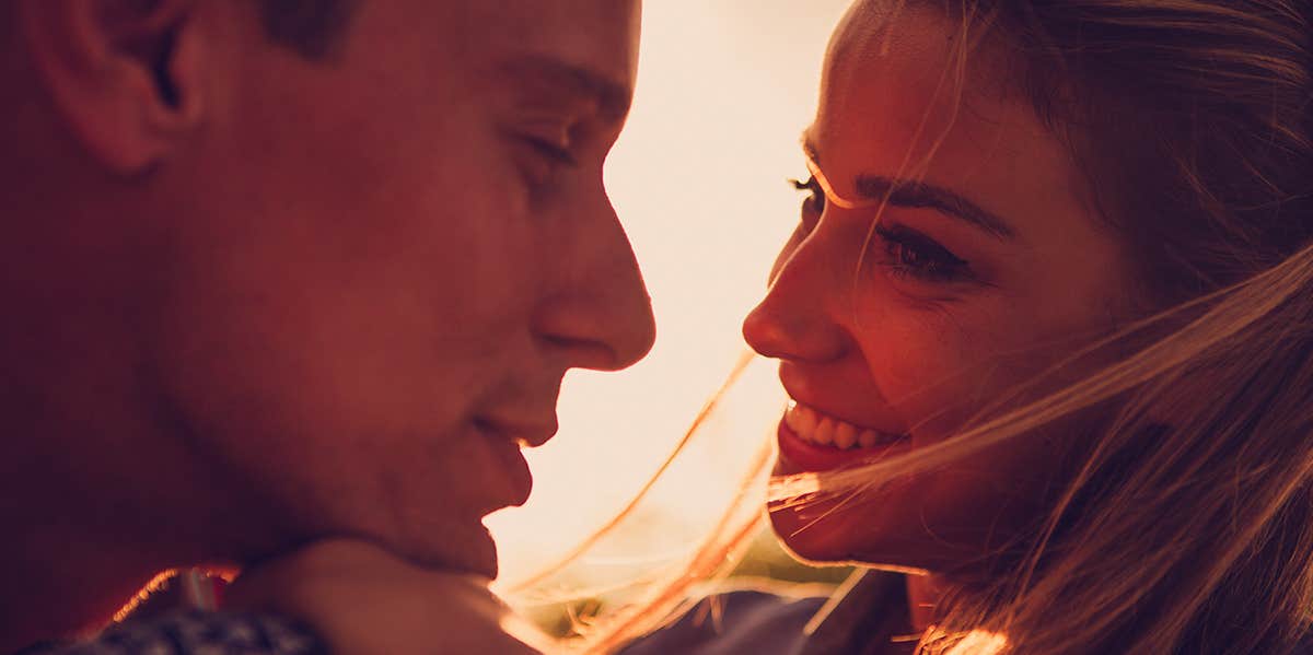 man and woman looking at each other close