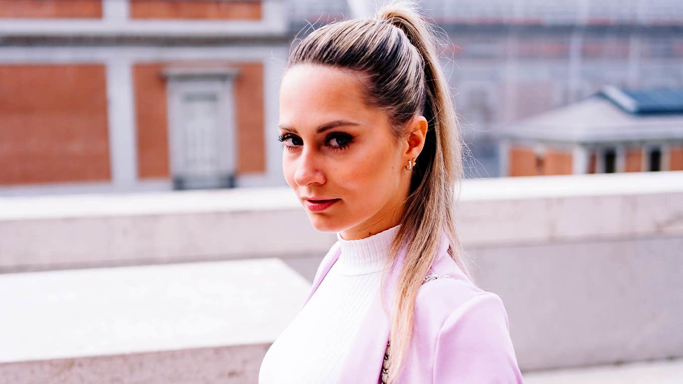 confident woman in pink outfit