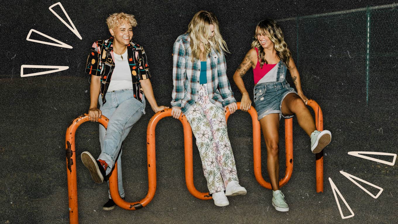 Friends hanging out on bike rack