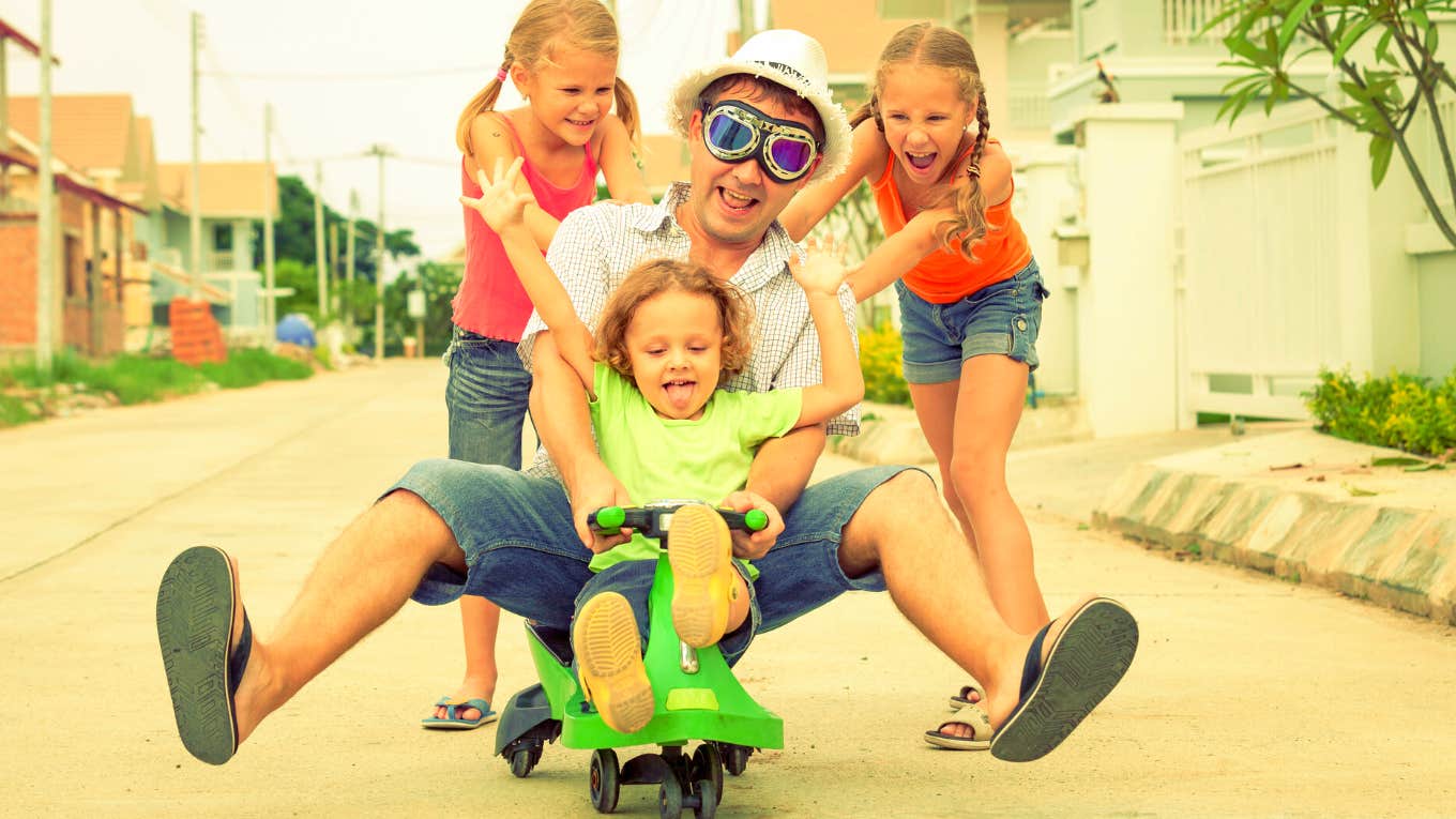 4 Ways To Make The Most Of Your Last Few Days Off With Your Kids dad having fun with his kids
