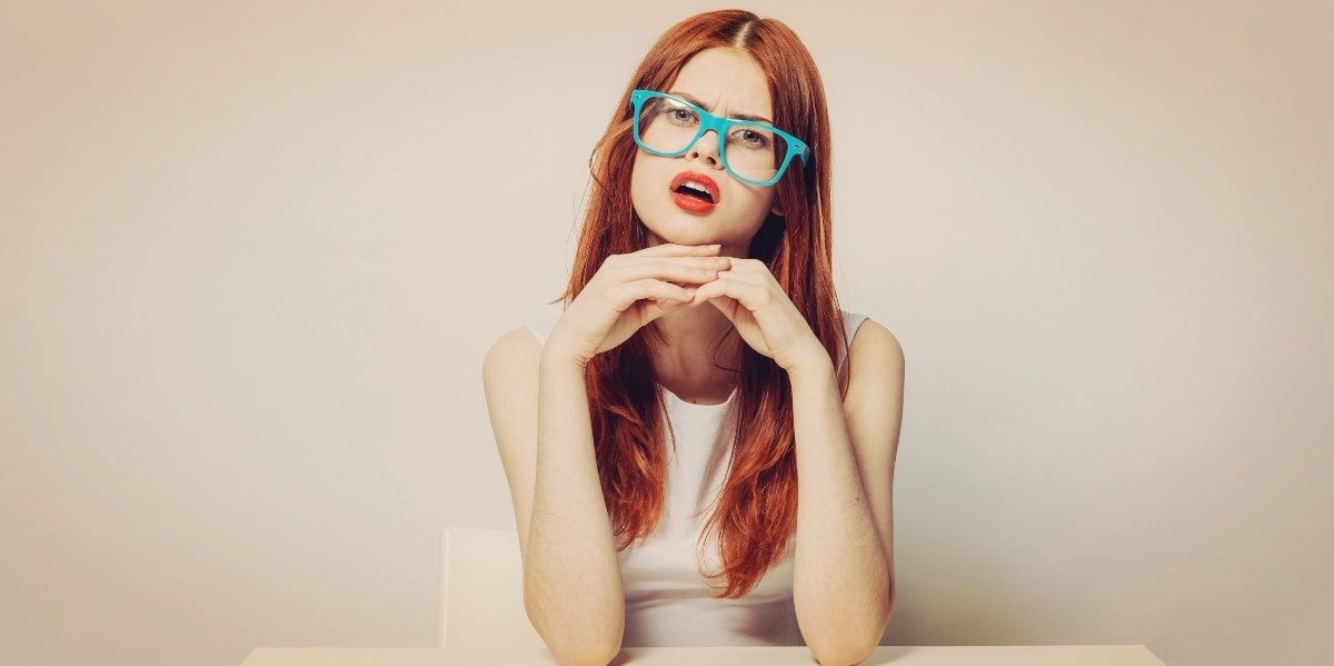 woman working from home feeling overwhelmed woman working from home feeling overwhelmed