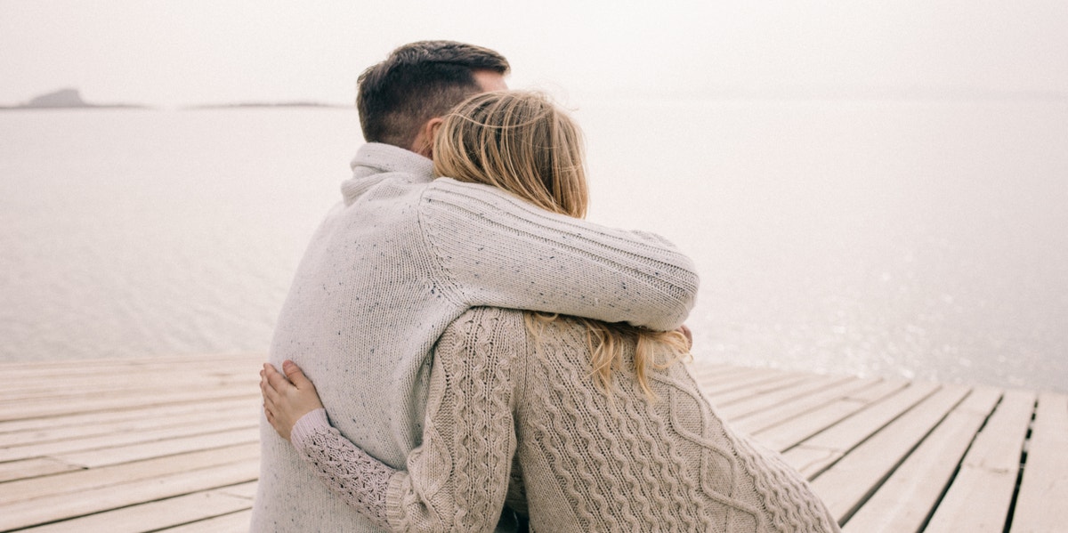 10 Ways To Show Him You're There For Him, No Matter What man hugging woman