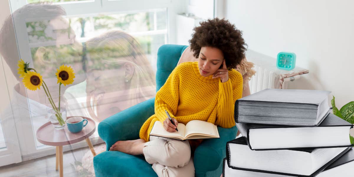 Woman writing in a book or diary