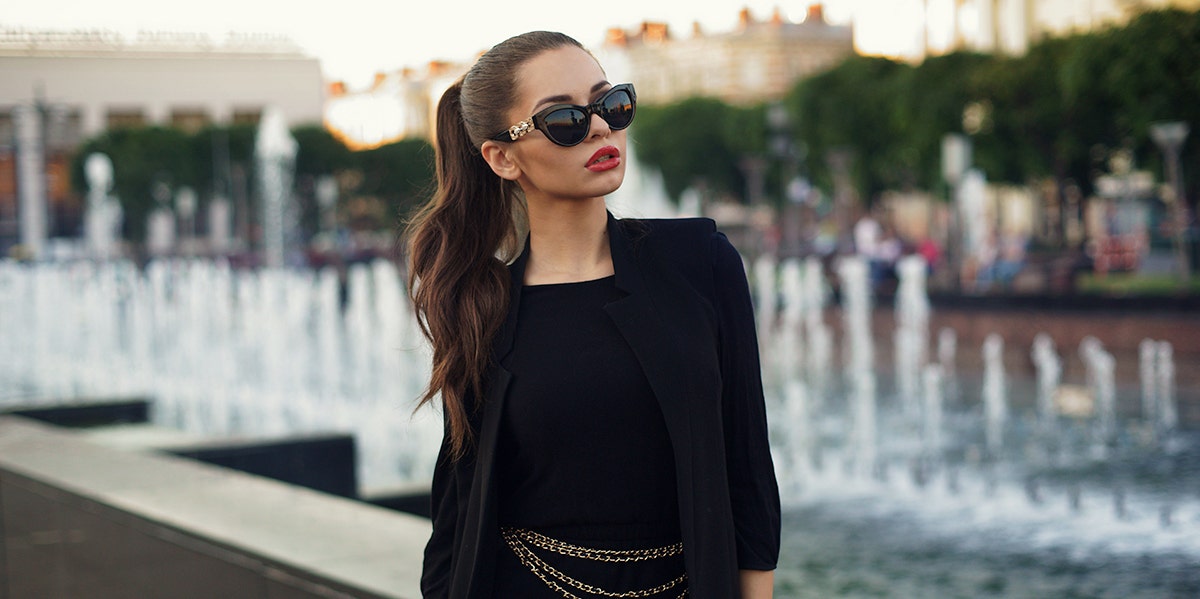 woman in black wearing sunglasses