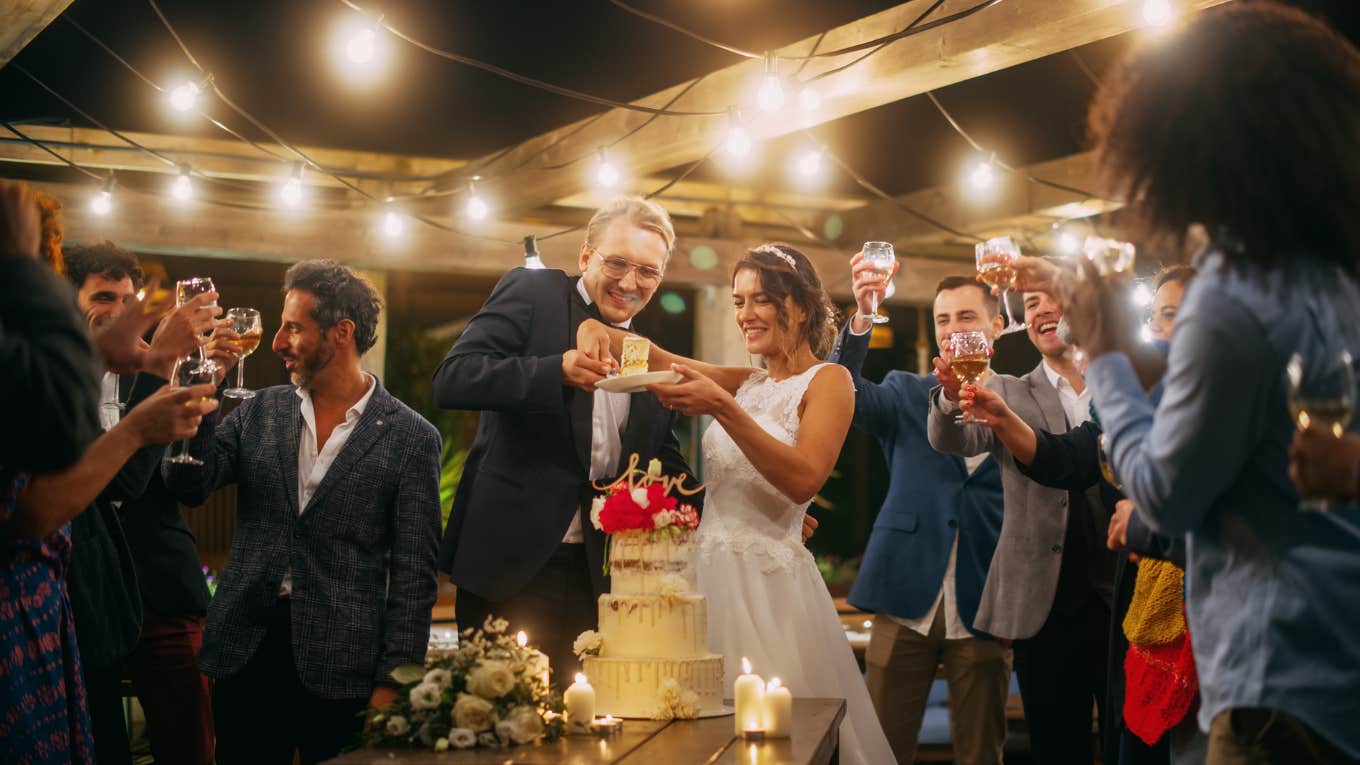 couple with wedding cake