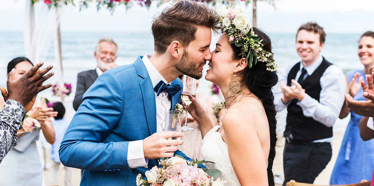 couple kissing at wedding