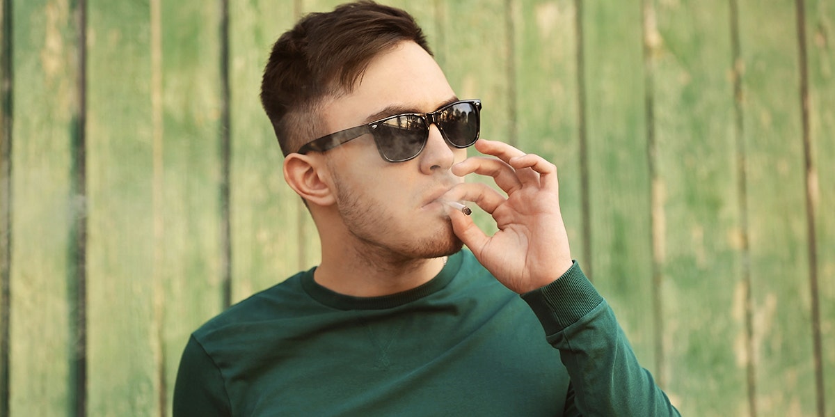 I'm A Better Parent When I'm Stoned man smoking marijuana
