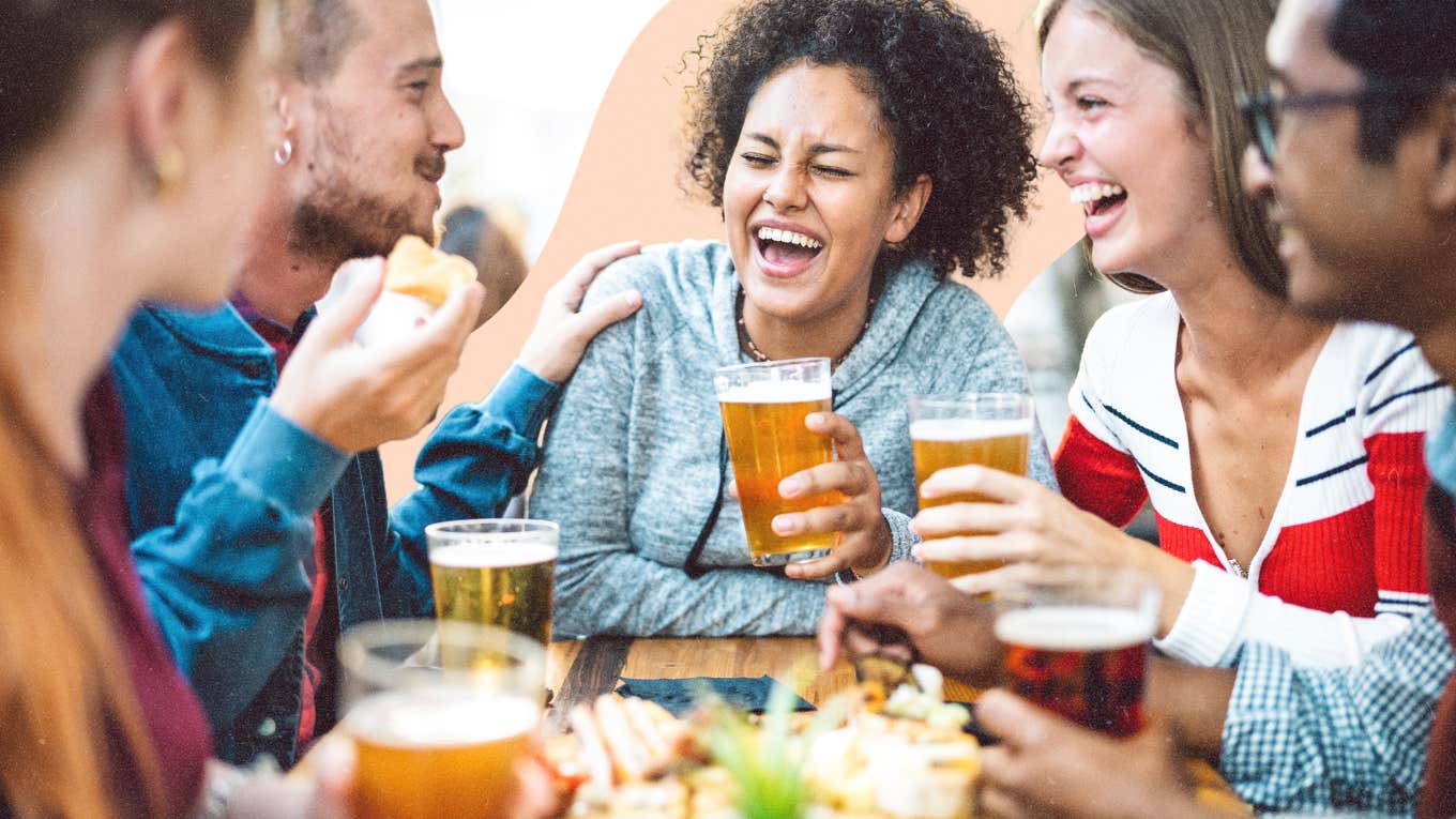 Woman at a brewery enjoying a adult beverage