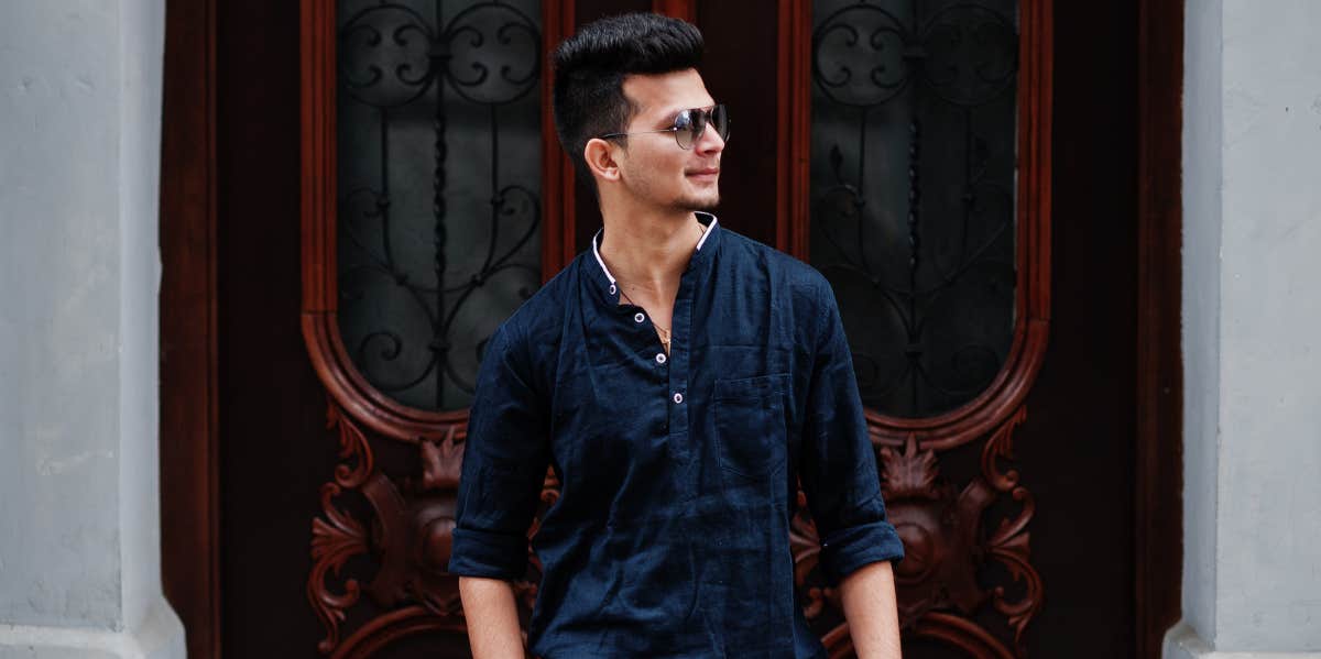 If He Does These 11 Things, Be Careful — He's A Casanova man standing in front of doors