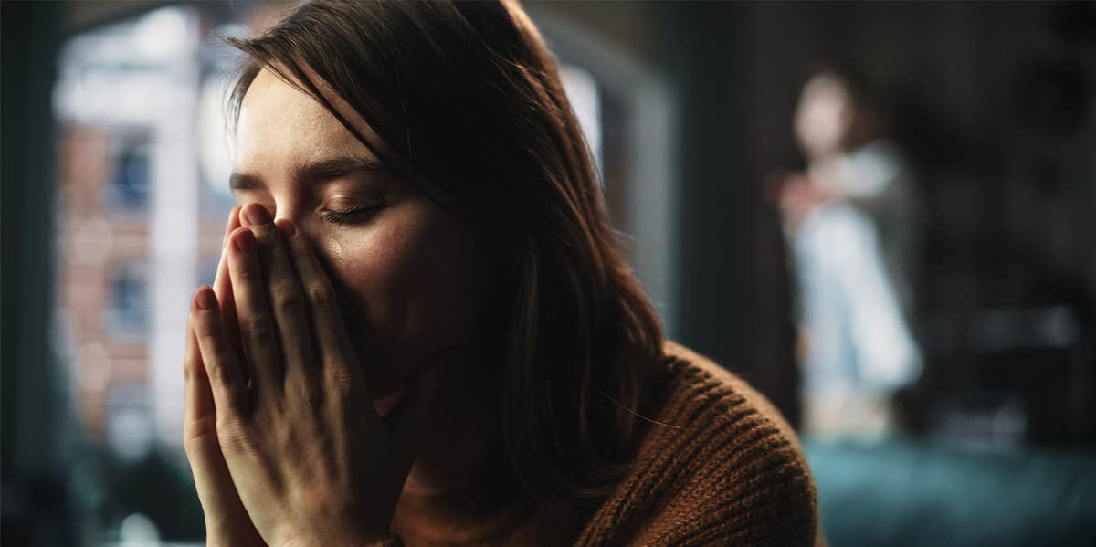 What Is Coercive Control? Alarming Details About The Scariest Form Of Emotional Abuse upset woman being emotionally abused by partner