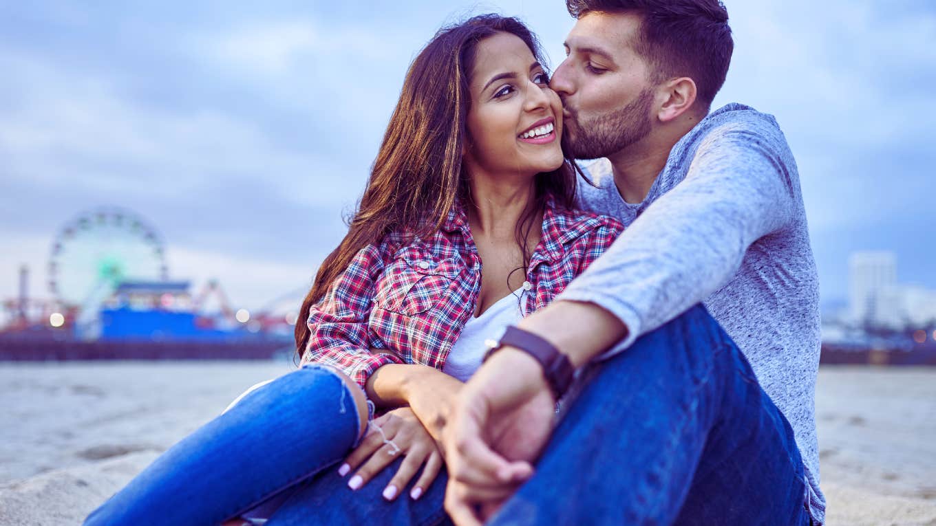 couple sitting on a beach