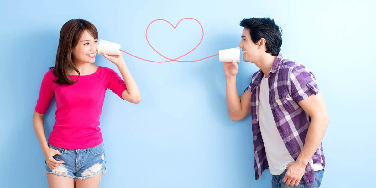 9 Things Happy Couples Talk About + 50 Deep Conversation Starters happy couple talking through cups