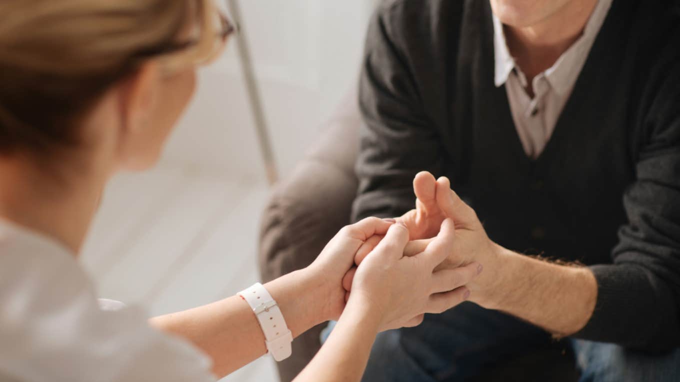 Couple holding hands 