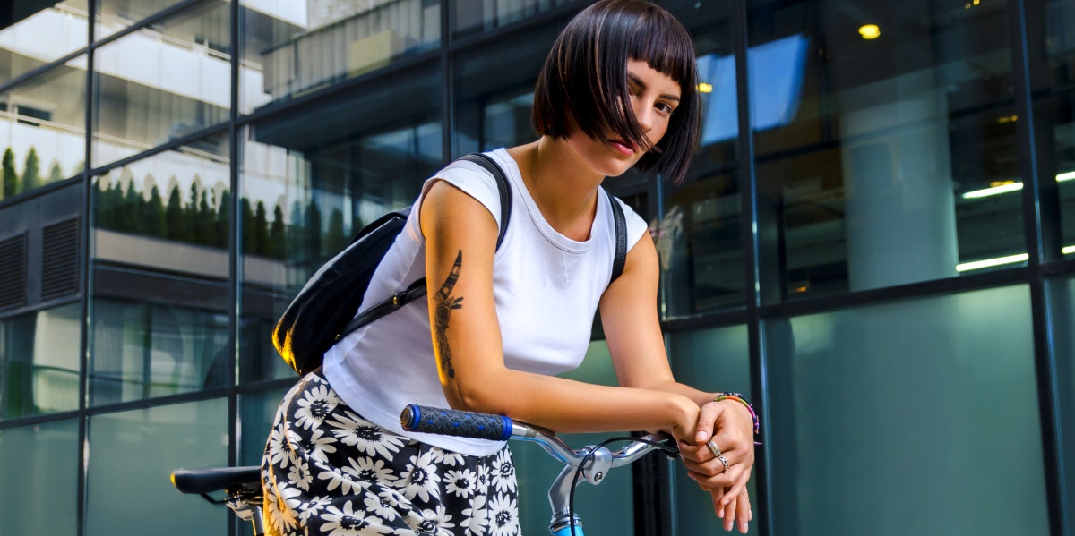 woman with a tattoo on her arm