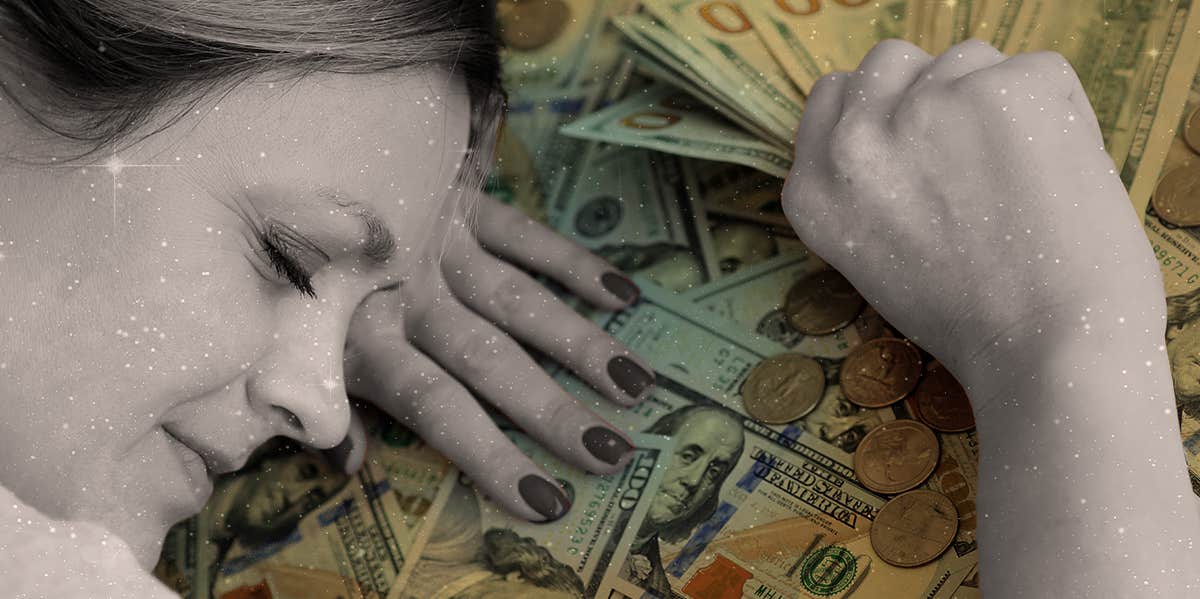 woman laying on money