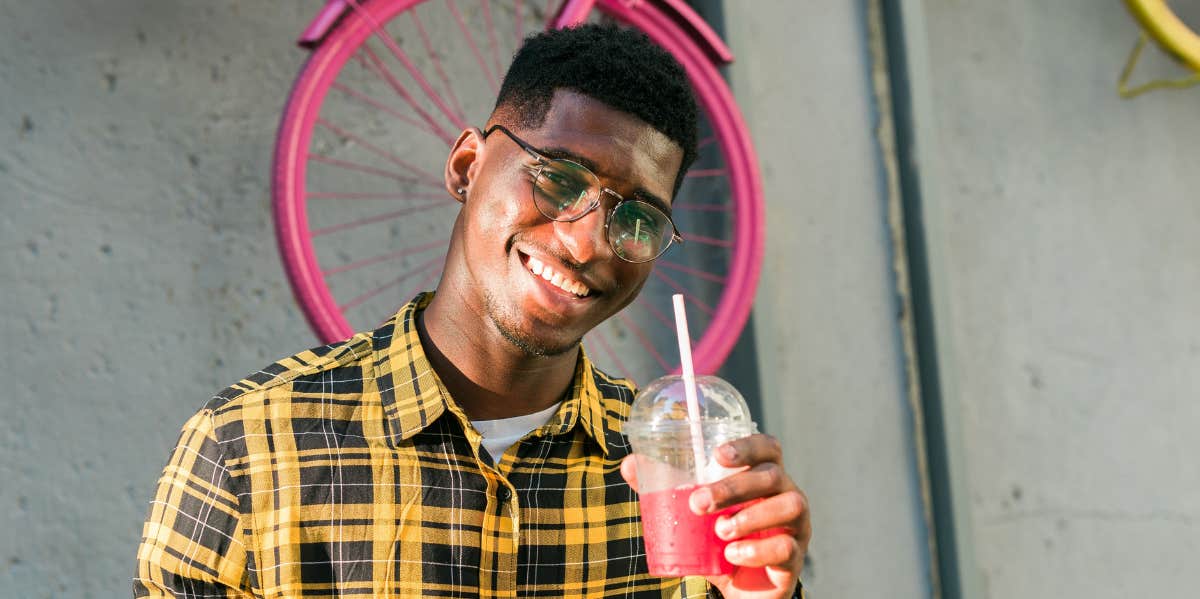 man drinking juice 