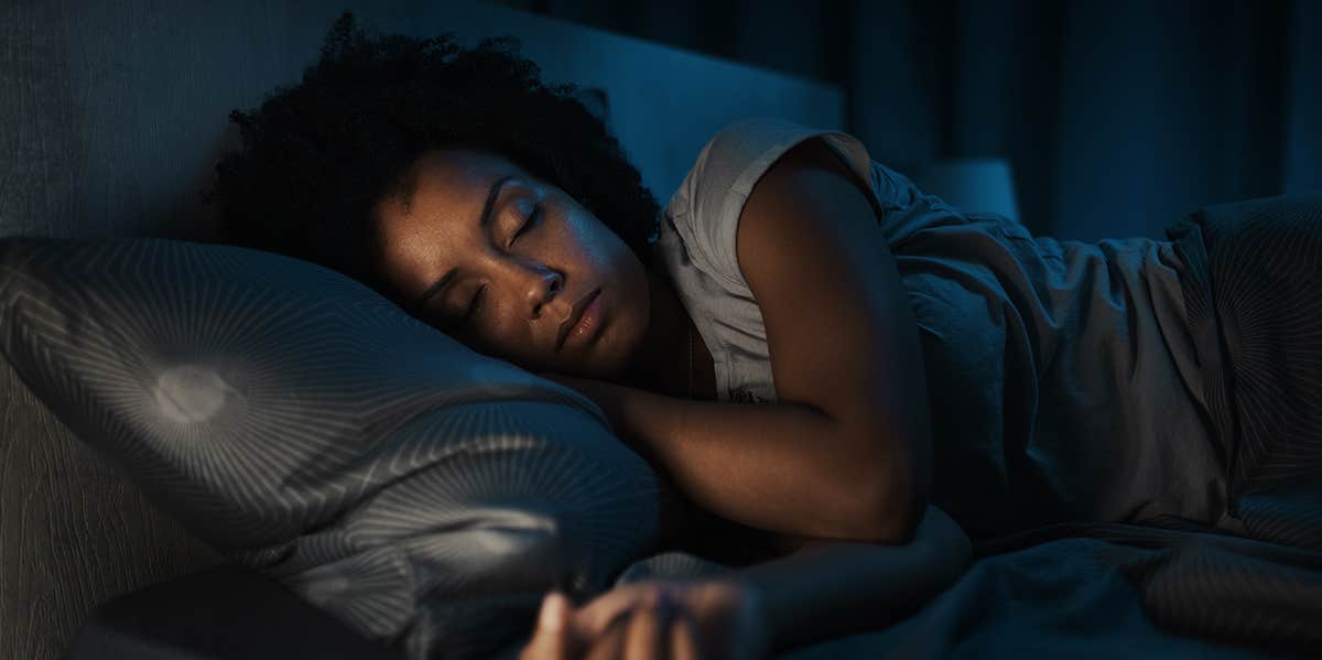 woman sleeping in bed