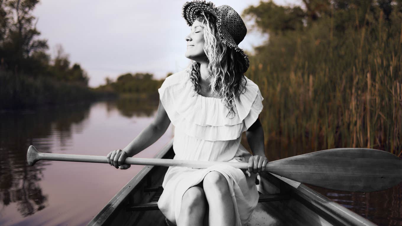 Woman happy on boat 