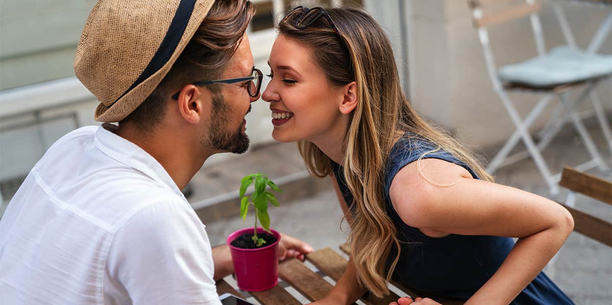 man and woman on dinner date