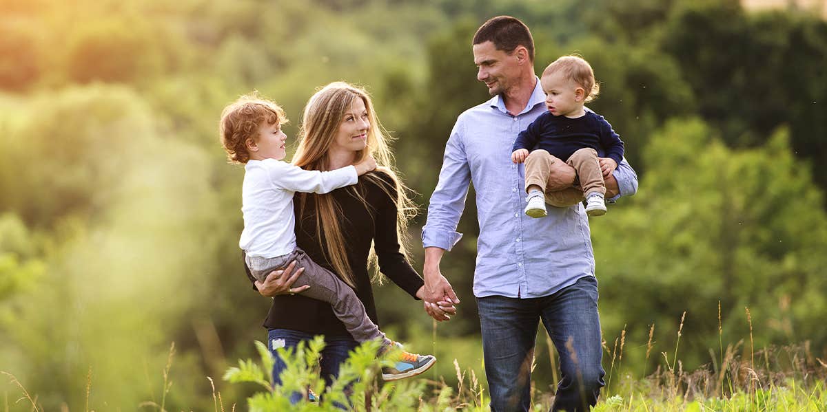 The Truth About What Having Kids Will Do To Your Marriage parents with 2 sons