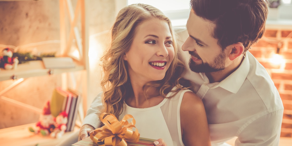 man giving woman gift