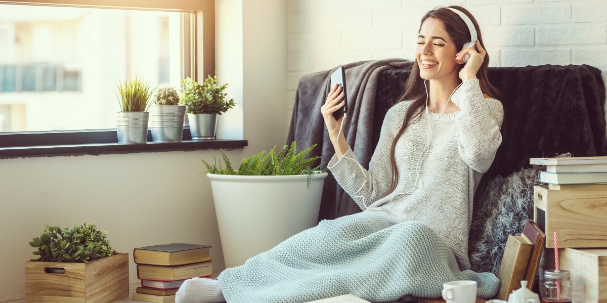 woman enjoying ASMR whisper relaxation videos