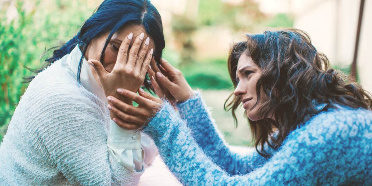 woman comforting upset friend