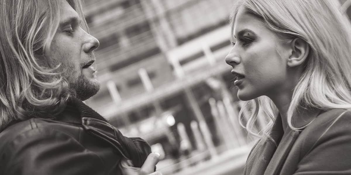 The Subtle Signs He's Cheating Right In Front Of You unhappy couple