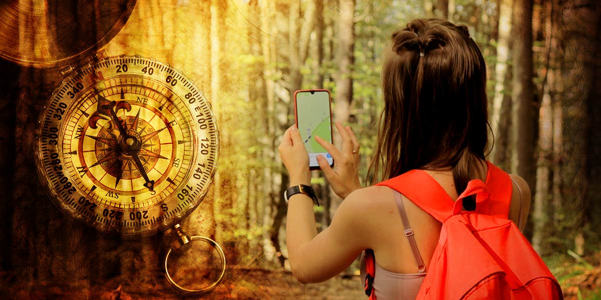 woman on phone compass