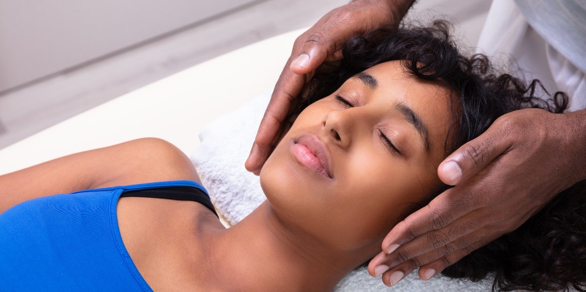 woman taking part in reiki practice