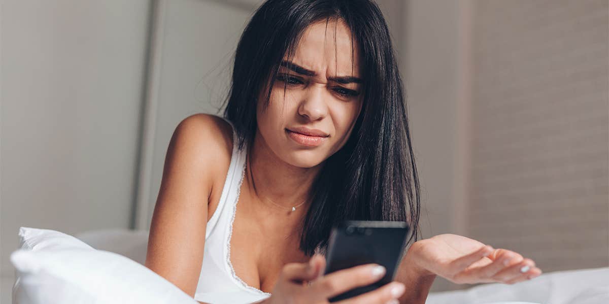 What Is Shadow Banning & How To Know If You're Being Censored confused woman on the phone