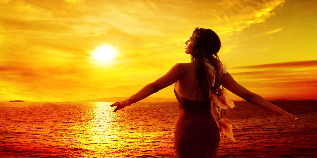 What Is A Soul Contract & How It Affects Your Purpose In Life woman by the water