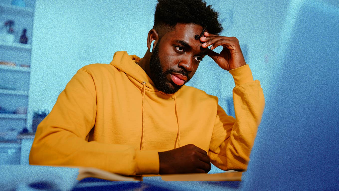 How To Tell If A ‘Stuck’ Mindset Is What's Keeping You From Finally Being Happy bored man at computer