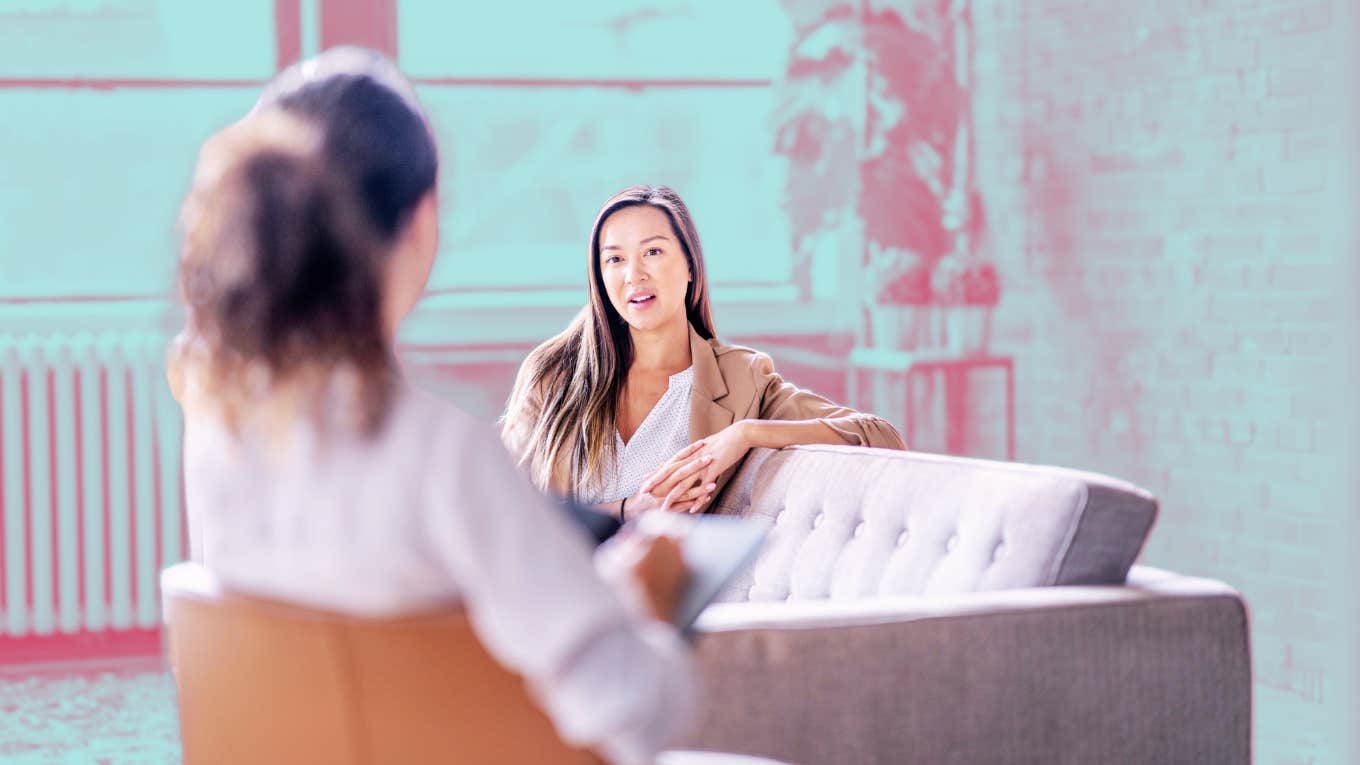 woman on couch talking to therapist