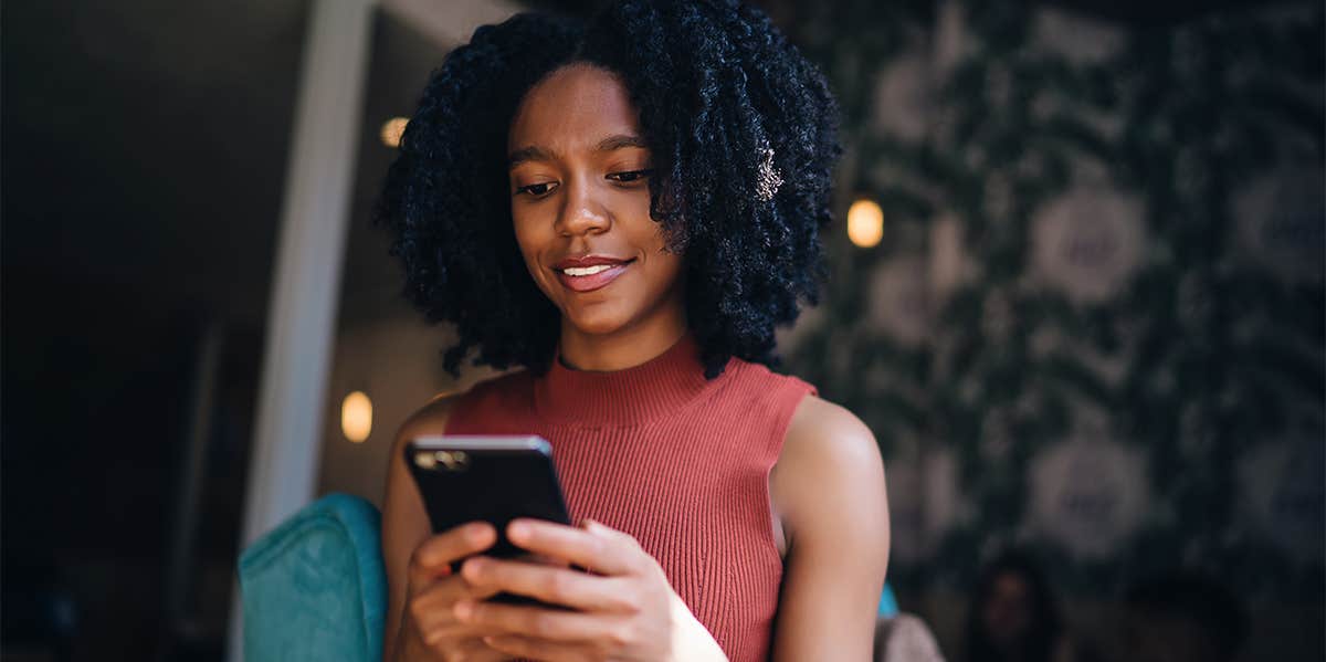 woman texting on phone