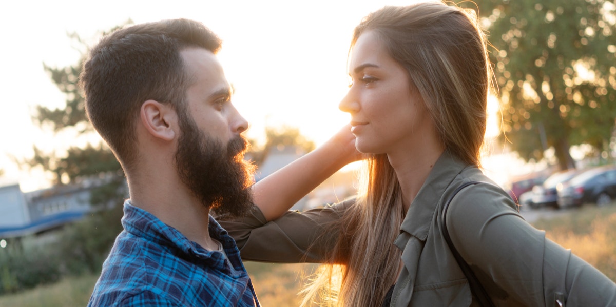 man and woman talking