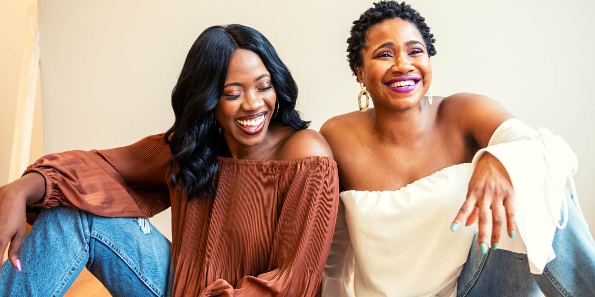 What It Really Means To Be Your Older Sister two sisters sitting together