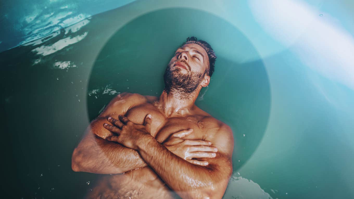 Man floating in sensory deprivation tank