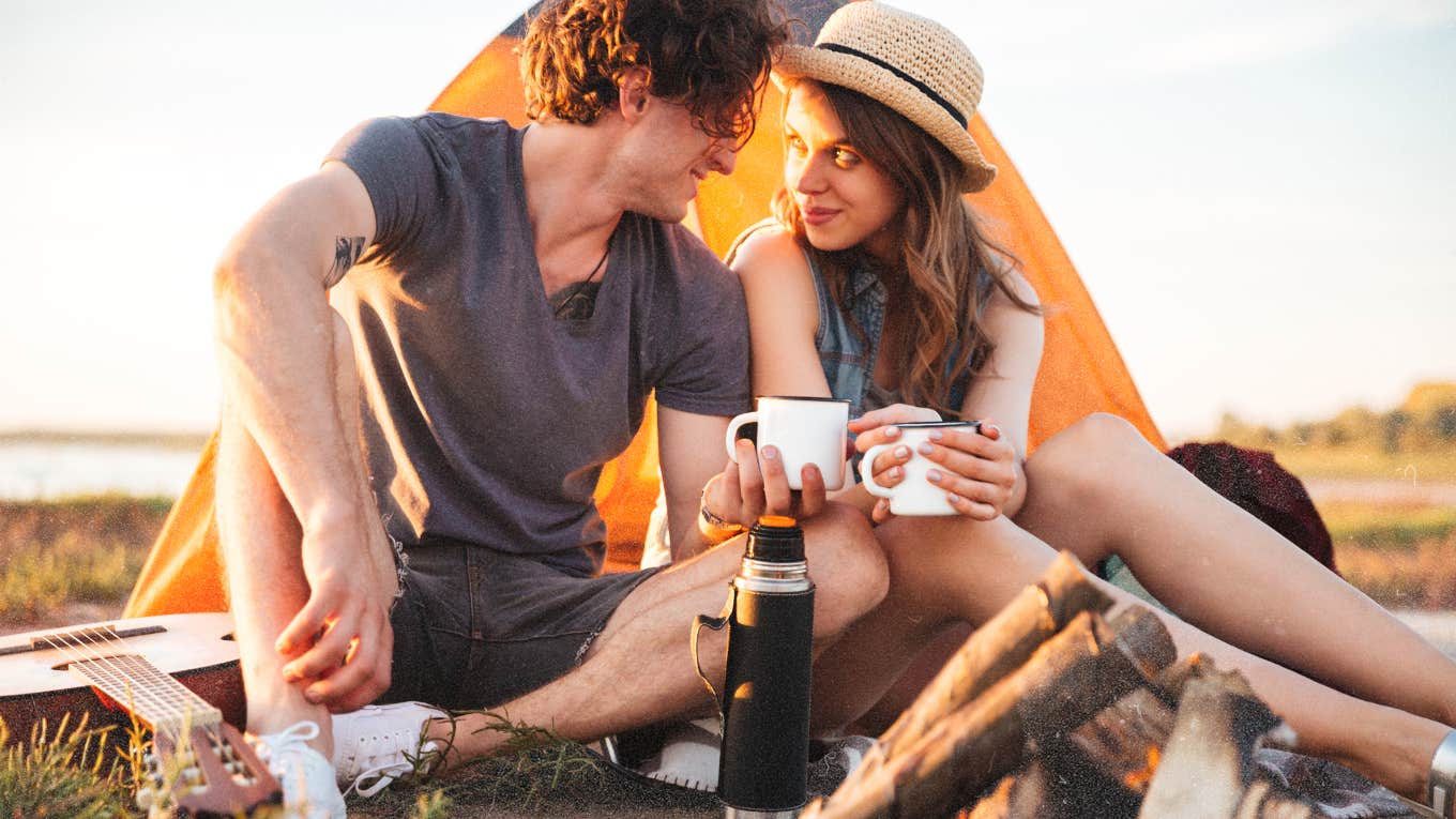 Couple camping outdoors