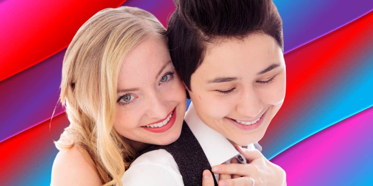 What Makes People Fall In Love a loving couple embrace against a vividly colorful background
