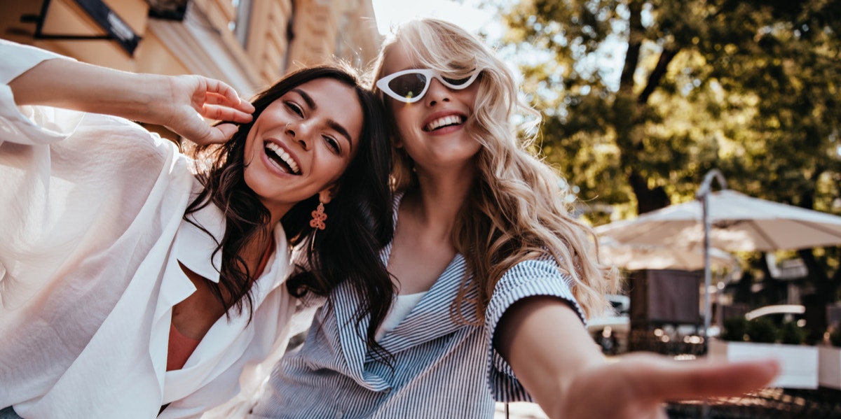 2 women smiling