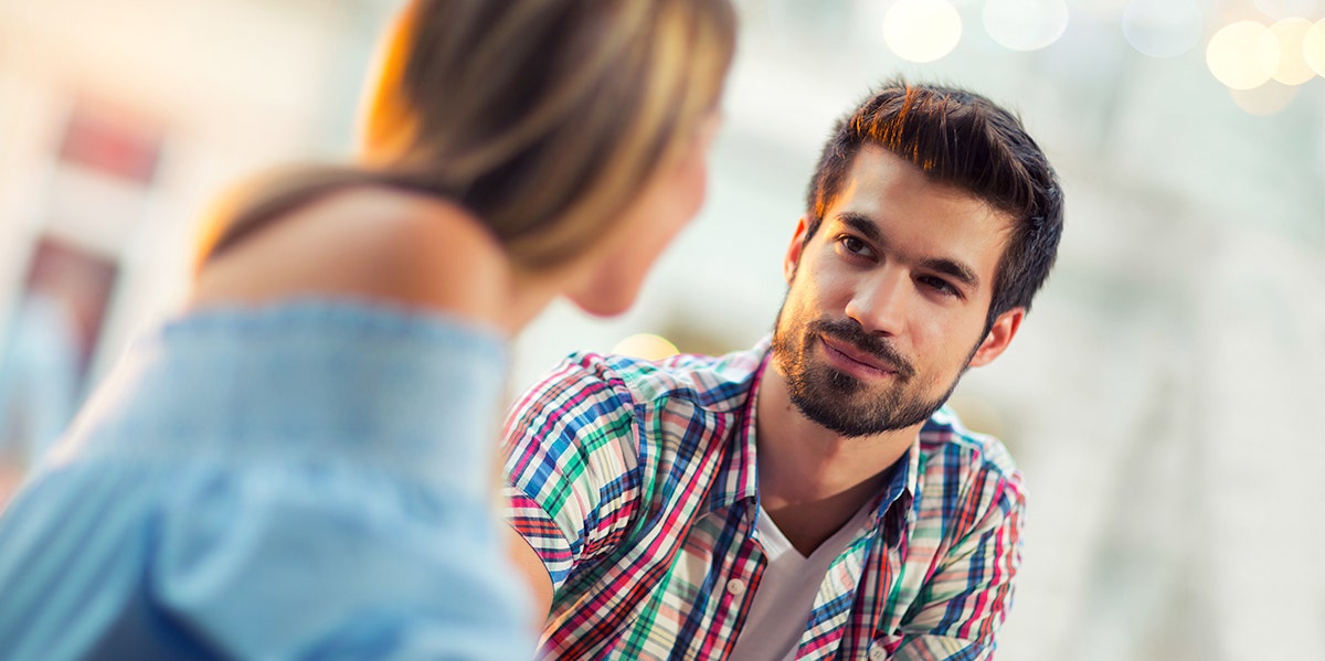 Personality Test: How Do Guys See You When They Look At You? man looking at woman