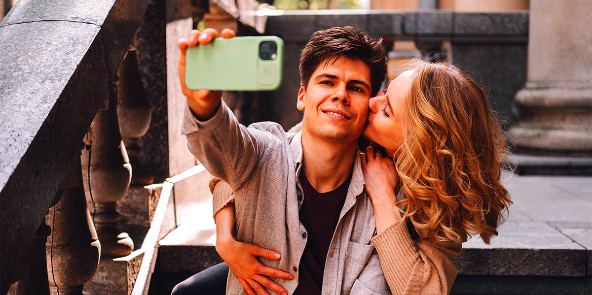 11 Things Guys Won't Tell The Woman They Love (That They Wish You Already Knew) man taking selfie with woman