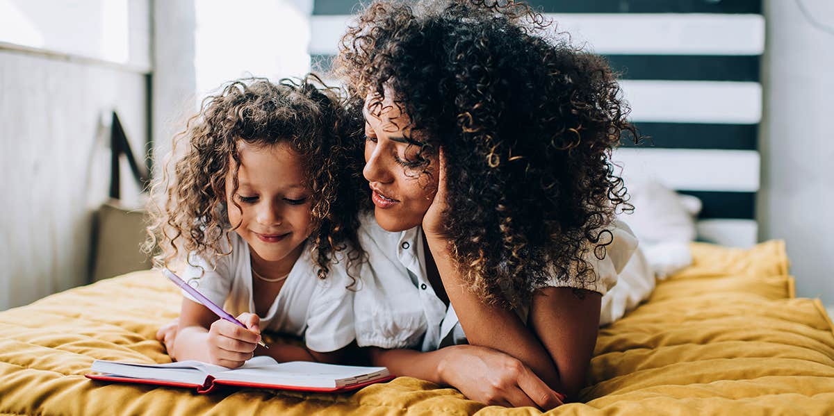 6 Truths I Tell My Daughter (That I Barely Believe Myself) mom and daughter writing in book