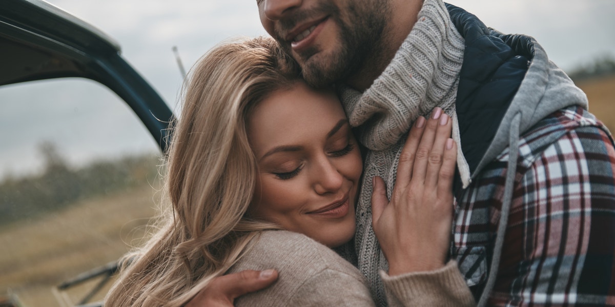 woman hugging man