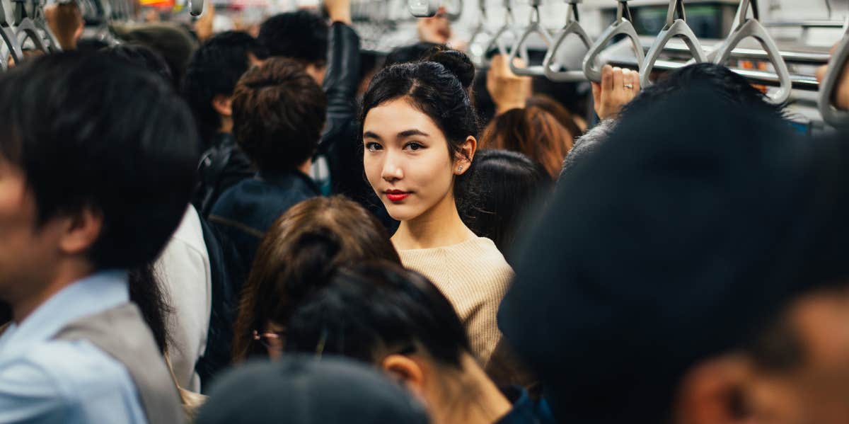 Psychology Test That Reveals How You Feel About Yourself & The People Around You woman on crowded train