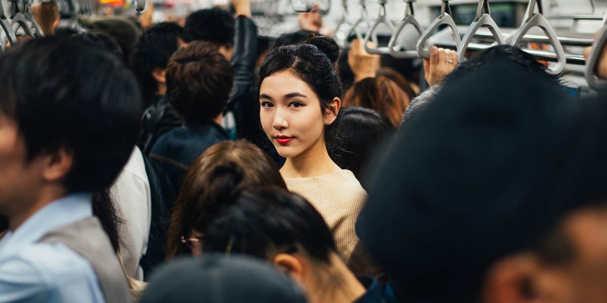 woman on crowded train