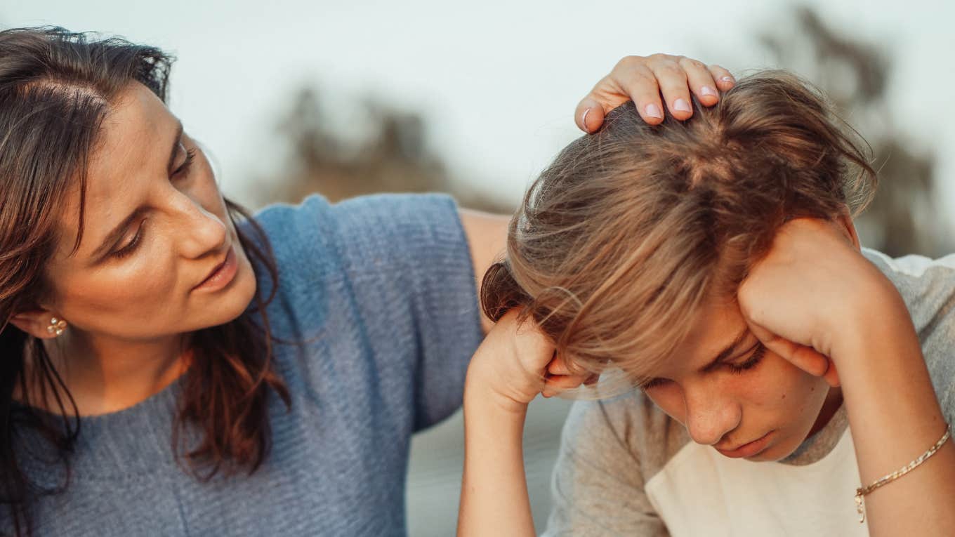 4 Tiny Things Kids Desperately Need From Their Parents During Divorce Mother showing love to her kid