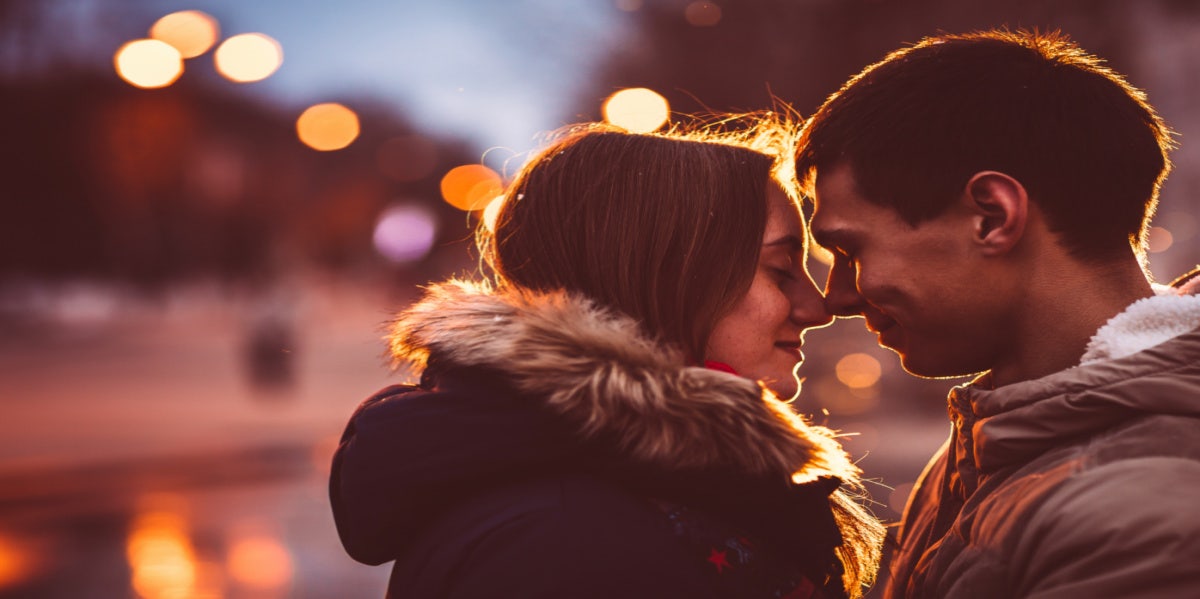 man and woman about to kiss